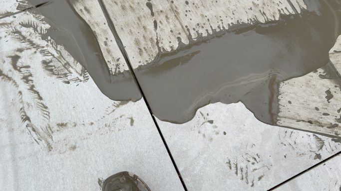 Flowpoint Patio Grouting Cardiff Flowpoint wet grout being applied to paving joints in Cardiff
