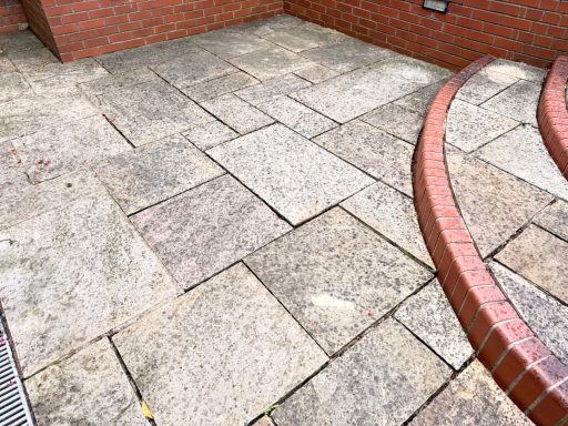 Patio paving before pressure washing and deep cleaning
